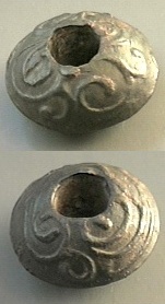 Enlarged photo of celtic spindle whorl
